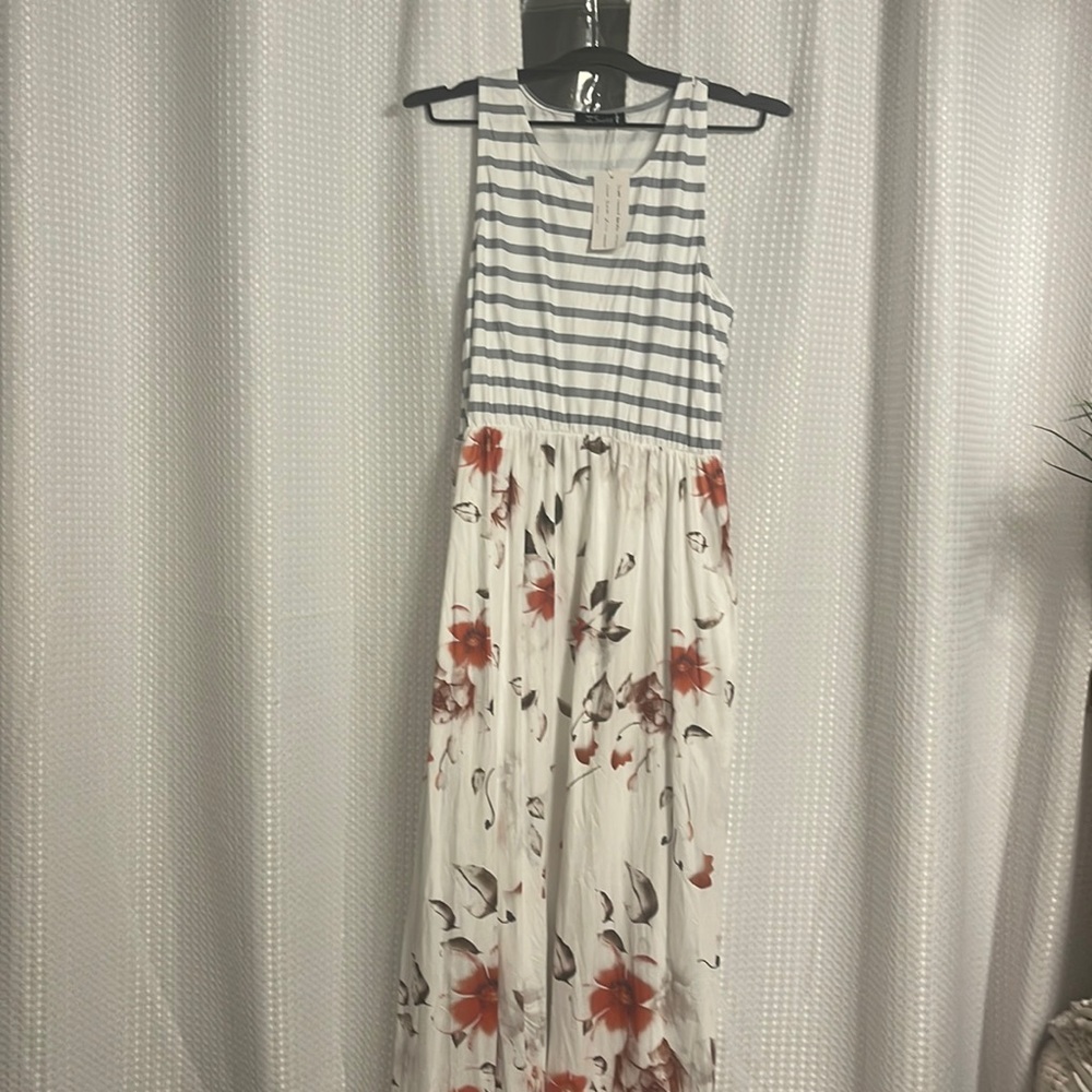 New with tags, maxi dress, striped top with floral, bottom and pockets.